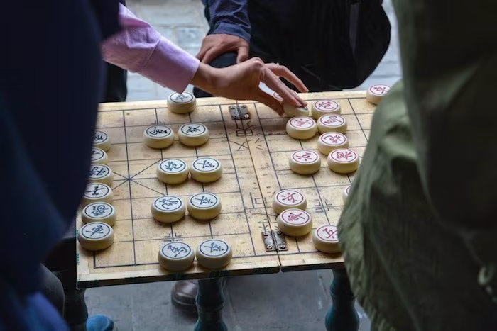 Juego en las calles de Pekín, China